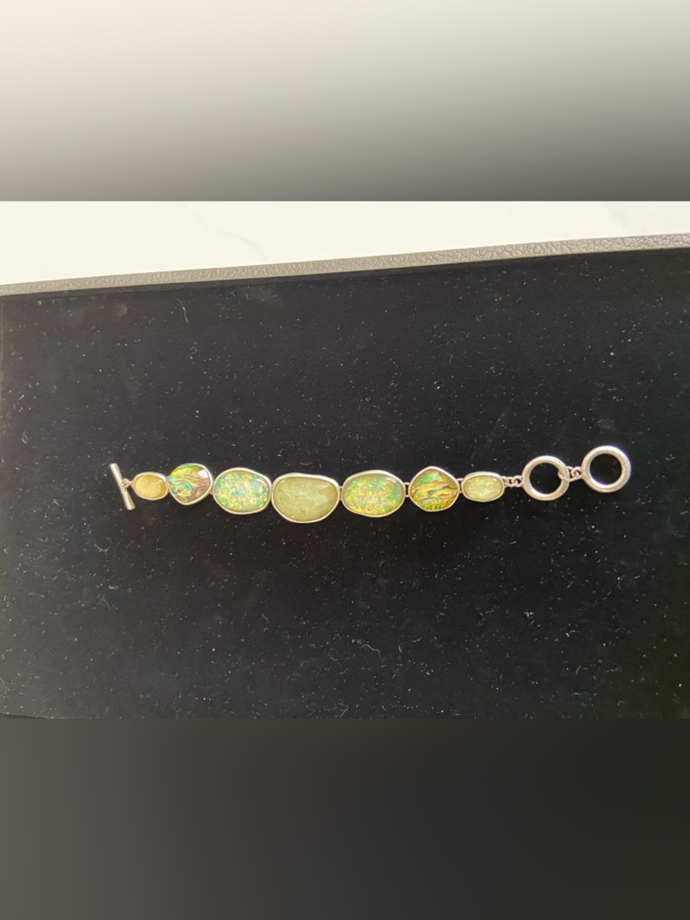 Australian triplet opal  silver bracelet.
Beautiful condition